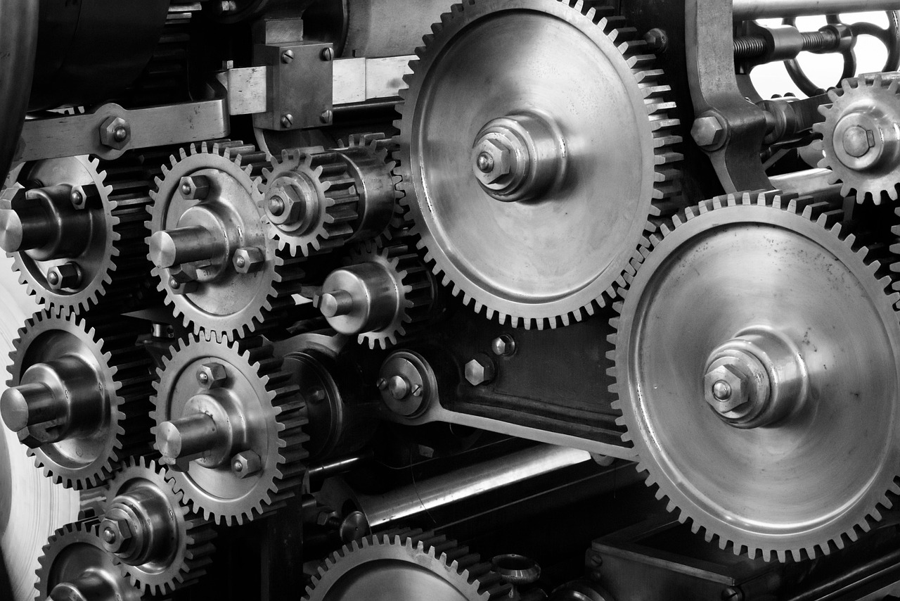 Gears, cogs, machine — Apache Kafka vs RabbitMQ: Which is Better for Message Brokering?